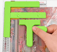 Green three-piece diamond painting tool set: right-angle ruler, straight ruler and T drill straightener on a canvas – image 6
