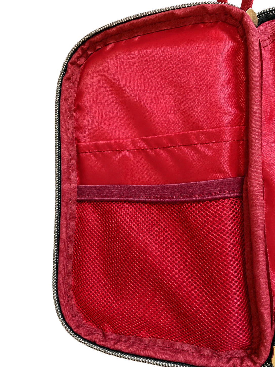 The Tool Keeper in true red, open, showing the red lining and mesh storage pocket